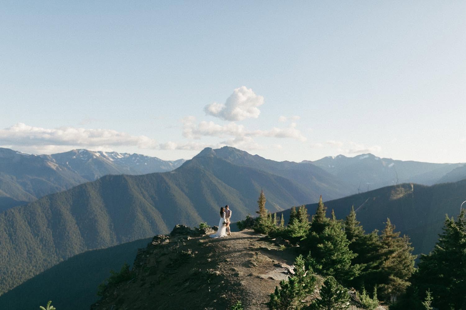 Couple at a mountain elopement on a ridge in Olympic National Park